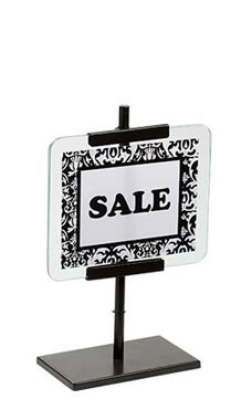 Do you place the sign in between 2 pieces of glass to hold the sign in place?