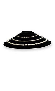 is this a solid piece or one that has to be folded into position ? I'm looking for a solid piece not a piece of cardboard with velvet covering.